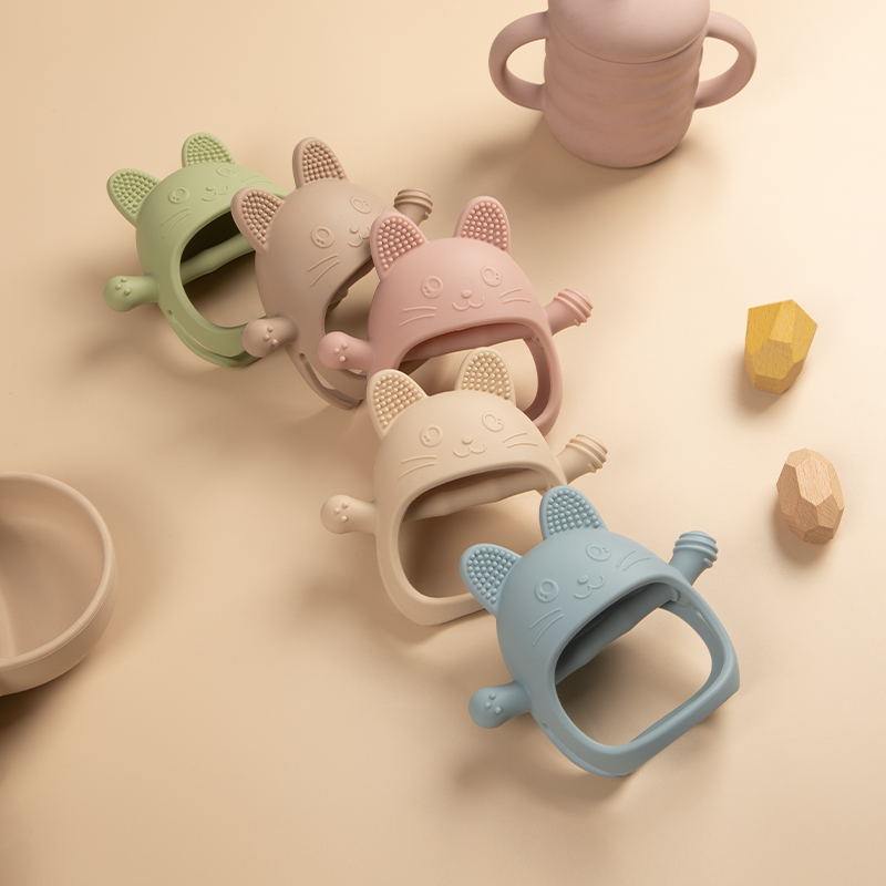 Baby Teething Toy Silicone Tee - đánh giá và giá Teething Mitten Baby
