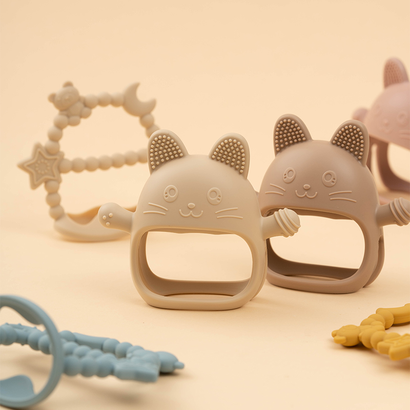 Baby Teething Toy Silicone Tee - đánh giá và giá Teething Mitten Baby